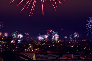 Fireworks in the nightly sky over a city